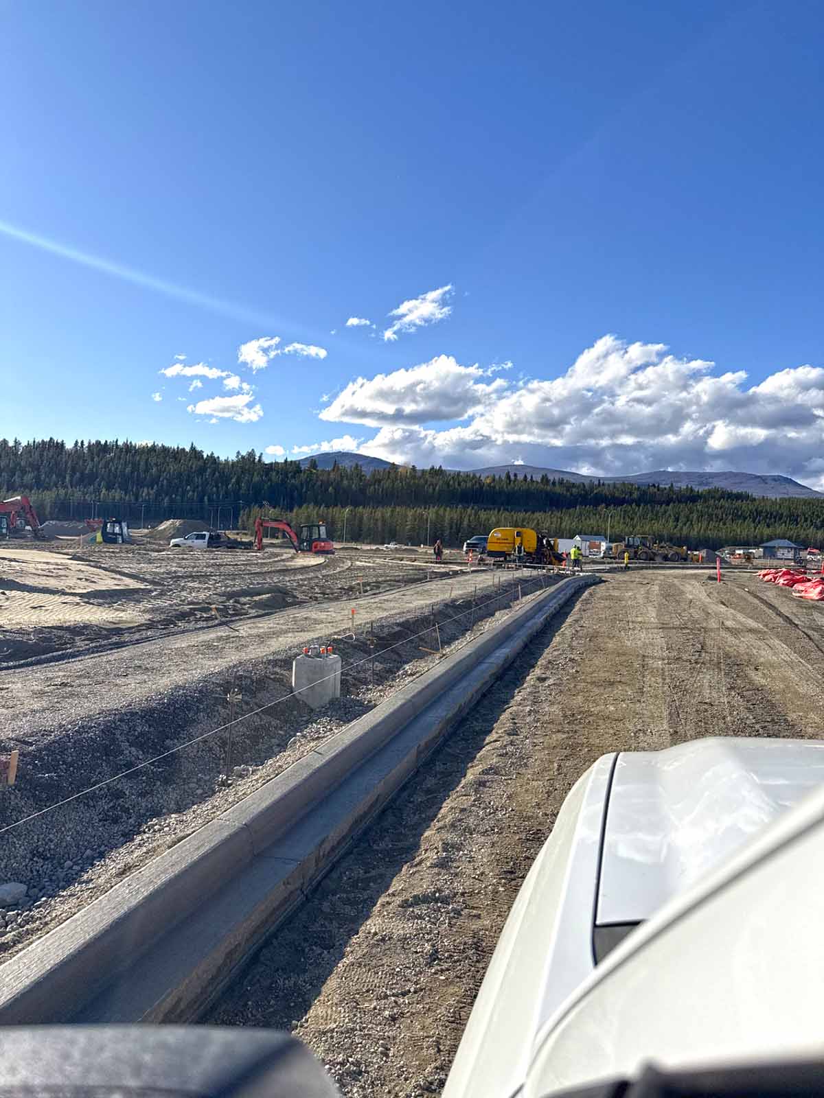 jlb concrete BC YK NWT road construction curb gutter sidewalks